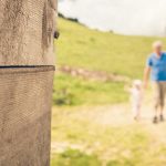 Grandpa and granddaughter hike